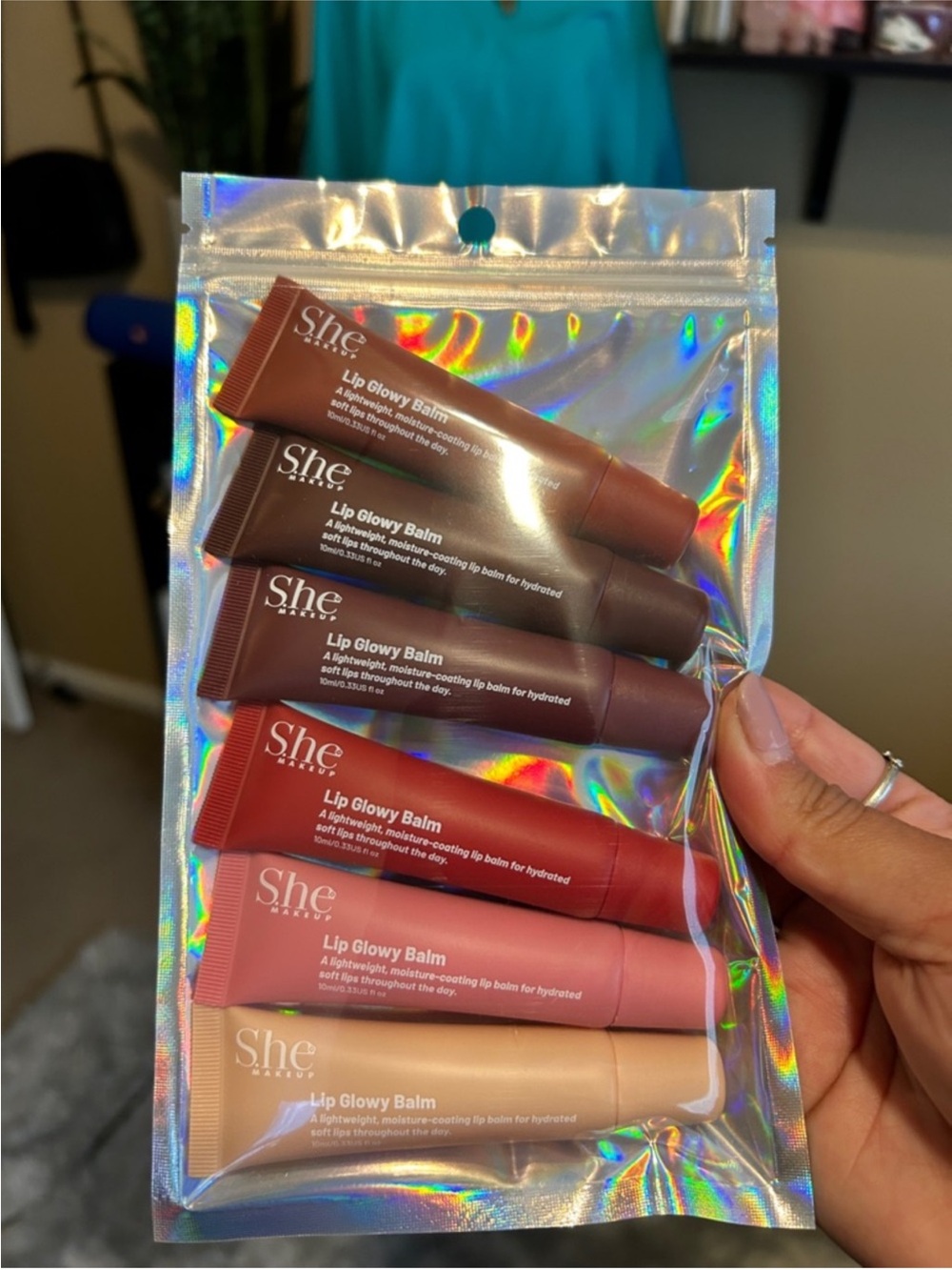 New she beauty six lip glowy balm  in different flavors